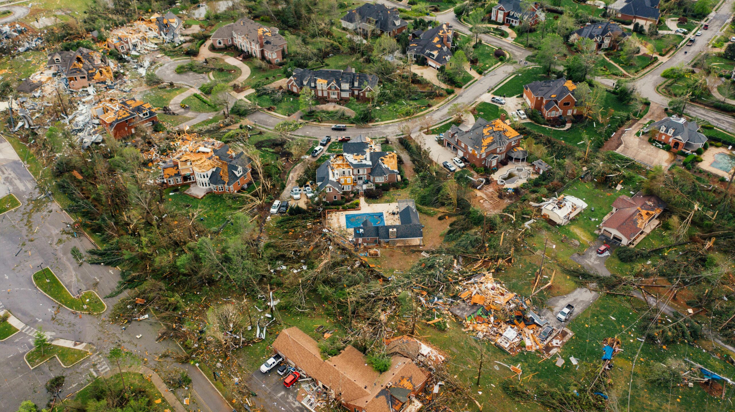 Aerial view showing severe tornado damage in Chattanooga, Tennessee neighborhood.